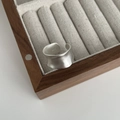 Macro view showing S925 hallmark on minimalist matte silver ring with irregular edges - Adjustable Open / Silver