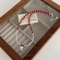Macro detail of red agate beaded necklace with silver bell pendant and lobster clasp - Red Beaded Bell Pendant Necklace (SN3411)