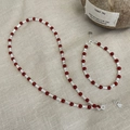 Dettaglio set di gioielli in argento S925 con perle di agata rossa e chiusura a moschettone - Bracciale Perline Rosse Tubo Argento (SB4156-Bracelet)