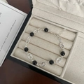 Detailed macro of S925 silver link bracelet with black onyx beads and lobster clasp - 925 Silver / Silver