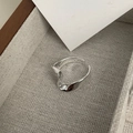 Macro detail of irregular wavy silver ring displayed in a premium jewelry gift box - Adjustable Open / Silver