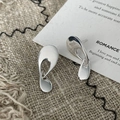 Detail of silver 925 drop earrings with hollow design and glossy metallic finish - 925 Silver / Silver