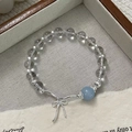 Detail of S925 silver beaded bracelet with blue crystal and delicate bow pendant - 925 Silver / Silver