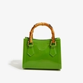 Vibrant green PVC square jelly bag with bamboo handle and golden hardware finish - Green