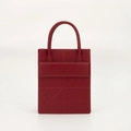 Structured red PU leather handbag with geometric triangle pattern and round handles - 175x85x210mm / Red