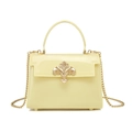 Mini PVC jelly handbag in cream yellow with golden floral buckle and chain strap - Yellow