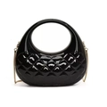 Close-up of black quilted patent leather hobo bag with gold chain strap detail - Black