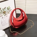 Chic red metallic water-drop handbag with circular handle and elegant gold chain strap - Red