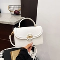 Minimalist white crossbody bag in litchi grain leather with golden metal lock detail - White