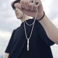 Minimalist silver spiral twist pendant necklace for men worn by model in outdoor light - Spiral Bar Pendant (NST-0051)
