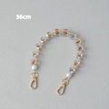Detailed view of a 36cm colorful heart acrylic bead chain with golden lobster clasps - 36CM / Coffee