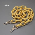 Dettaglio catena borsa in resina gialla da 85cm con fibbie in metallo argentato - 85cm / Giallo