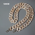 Detalle de la correa de resina acrílica de 120 cm con textura de mármol y cierres metálicos - 120cm / Beige