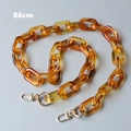 Close-up of 86cm amber acrylic resin chain strap with light gold spring hooks for handbags - Amber (86cm)