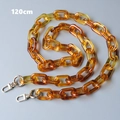 Detail view of 120cm amber resin chain strap with polished gold metal swivel hooks - Amber (120cm)
