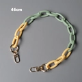 Detail view of a 46cm bicolor acrylic resin bag chain in green and cream yellow - Light Green and Cream Yellow Stitching