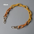 Close-up of 46cm two-tone resin chain strap with yellow and orange links and gold clasps - Yellow and Orange Yellow Stitching