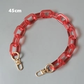 Detail view of 45cm candy red acrylic bag chain strap with gold metal lobster clasps - Watermelon red / 45cm