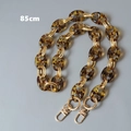 Close-up of 85cm amber resin chain with gold metal rings and lobster clasps - Amber 85CM
