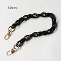 Dettaglio tracolla a catena in acrilico nero da 40cm con moschettoni dorati - 40CM / Nero