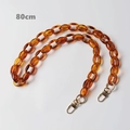 Detail of 80cm amber acrylic resin purse strap chain with gold metal lobster clasps - 80cm / Amber
