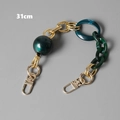 Detail showing a 31cm vintage green marble resin bag chain with golden metal clasps - 31cm / Green