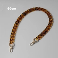 Detailed view of a 60cm leopard print acrylic bag chain with golden metal lobster clasps - Fishbone Leopard / 60CM