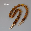 Detalle de la cadena para bolso de 60cm en acrílico ámbar con cierres de metal dorado pulido - Color Sólido 60CM