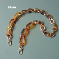 Vista detallada de la cadena para bolso de 66 cm en resina ámbar y metal dorado con ganchos - Patchwork de Ámbar 66CM