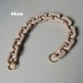Dettaglio tracolla in acrilico beige da 46cm con anelli metallici dorati per borse - 46cm / Albicocca