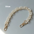 Detail view of 35cm milky white acrylic chain with gold spring buckles for bags - 35cm / Jelly White