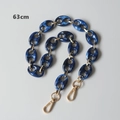 Detail view of dark blue marble resin chain links with gold metal rings and lobster clasps - Blue-63CM