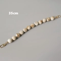 Dettaglio catena per borsa da 35cm in perline acriliche marmorizzate con ganci dorati - 35cm / Perle Tonde Beige