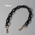Detailed view of a 44cm matte black acrylic chain strap with gold swivel spring hooks - 44cm / Black