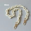 Close-up of a 60cm white acrylic chain strap featuring shiny gold lobster clasps - 60CM / White