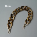 Detalle de cadena de bolso de 40cm en resina acrílica carey con cierres de metal dorado - 40CM / Marrón