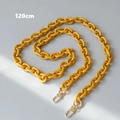 Detailed view of a 120cm yellow acrylic chain strap with gold metal lobster clasps - 120cm / Yellow