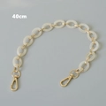 Detalle de la cadena de 40cm en resina acrílica crema con cierres de metal dorado para bolsos - Albaricoque 40CM
