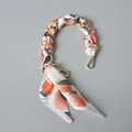 Detail of gold metal chain woven with floral silk scarf featuring orange fruit patterns - Standard Size / White Base Orange Fruit Print (3)