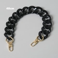 Detailed view of a 40cm black resin bag chain with polished gold swivel lobster clasps - Pure Black 40cm