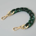 Detail view of dark green marble acrylic chain links with golden metal lobster clasps - 28cm / Green