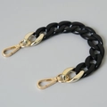 Detail of chunky black acrylic fishbone chain with golden lobster clasps for phone or bag - 28cm / Black