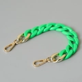 Macro view of bright green acrylic fishbone chain with shiny gold metal spring clasps - 28cm / Emerald Green
