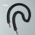 Close-up of 80cm matte black resin chain with gold metal lobster clasps for handbags - 80cm / Black