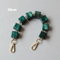 Close-up of 30cm dark green marble resin chain handle with gold lobster clasps - 30cm / Green