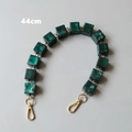 Detail view of 44cm green marble resin acrylic bag chain with gold lobster clasps - 44cm / Green