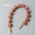 Close-up of 44cm pink marble resin bag strap with gold lobster clasps and metal rings - 44cm / Pink