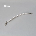 Detail view of a 30cm white pearl bag strap with silver metal lobster clasps - Silver Clasp-30CM