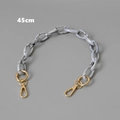 Detail view of a 45cm black and white marble acrylic chain with gold lobster clasps - Ink White / 45cm