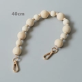 Dettaglio tracolla in perle di legno naturale da 40cm con ganci in metallo oro chiaro - Perline Tonde Graduate (Stile 2)